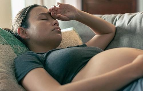 tired woman walking without much sleep