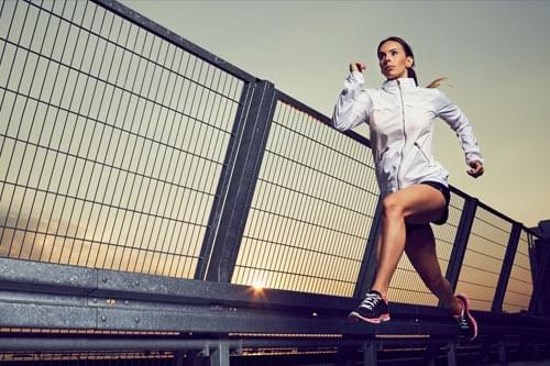 woman running with energy after sleeping well