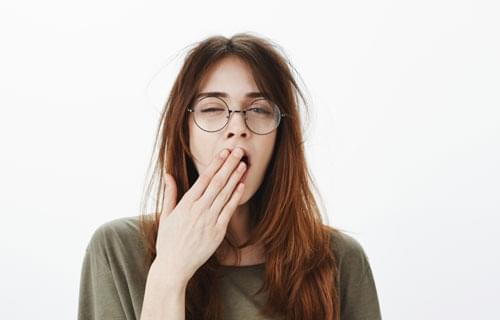 tired woman yawning