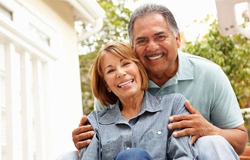 older woman with coffee after a good night's sleep
